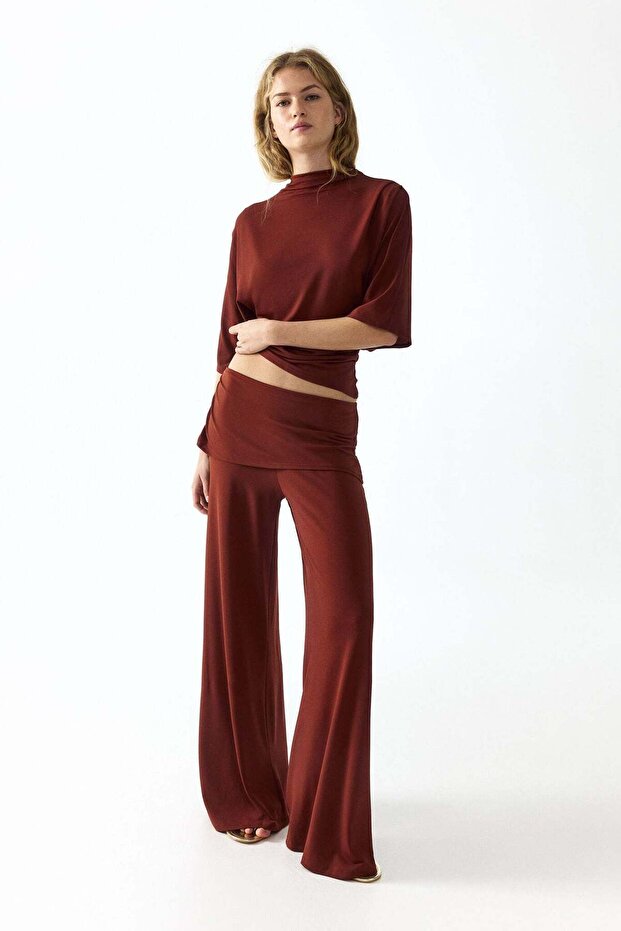 Draped fine-knit trousers