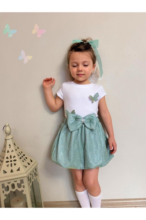 Girl's Festive Summer Outfit with Stylish Bow Detail and Glittery Balloon Skirt