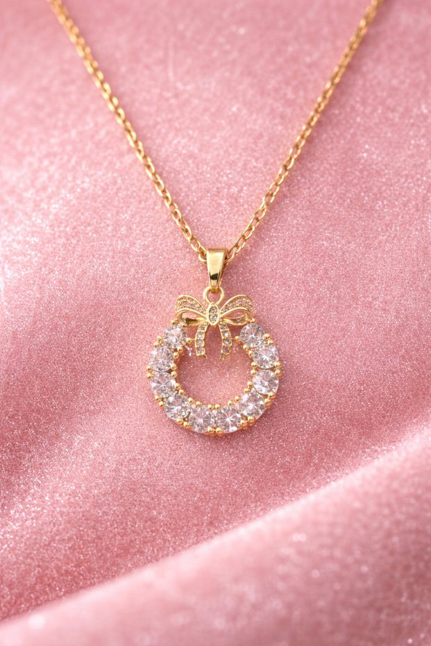 Sparkling Steel Necklace with Bow Detail (Gold Color)