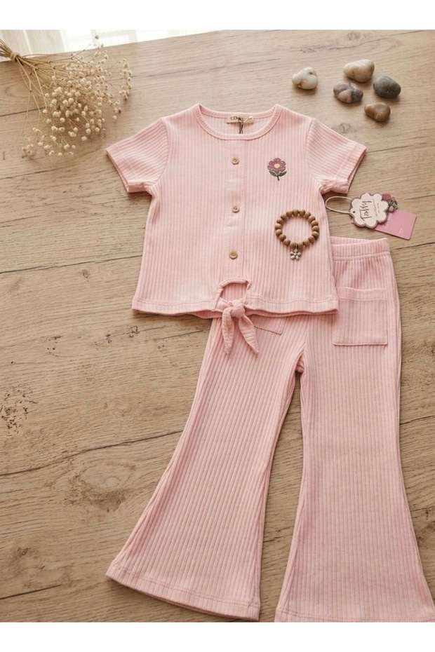 Girl's summer two-piece set: 100% cotton top and bottom with pocket and button details.