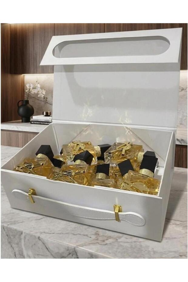 وكس توزيعات العطور الميني (25ml) في بوكس ابيض وانيق مكون من (12 عطر ميني )