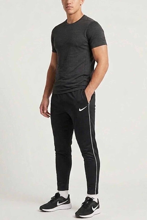 بنطلون رياضي أسود للرجال من Dri-FIT - بنطلون تدريب ضيق الساق