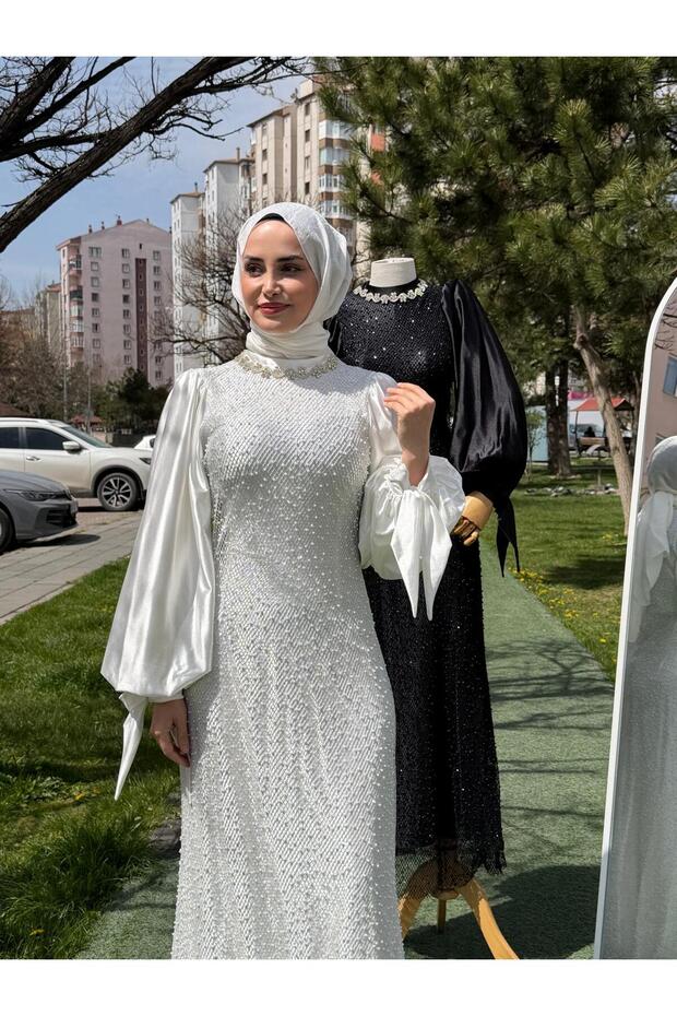 فستان سهرة بأكمام من الساتان