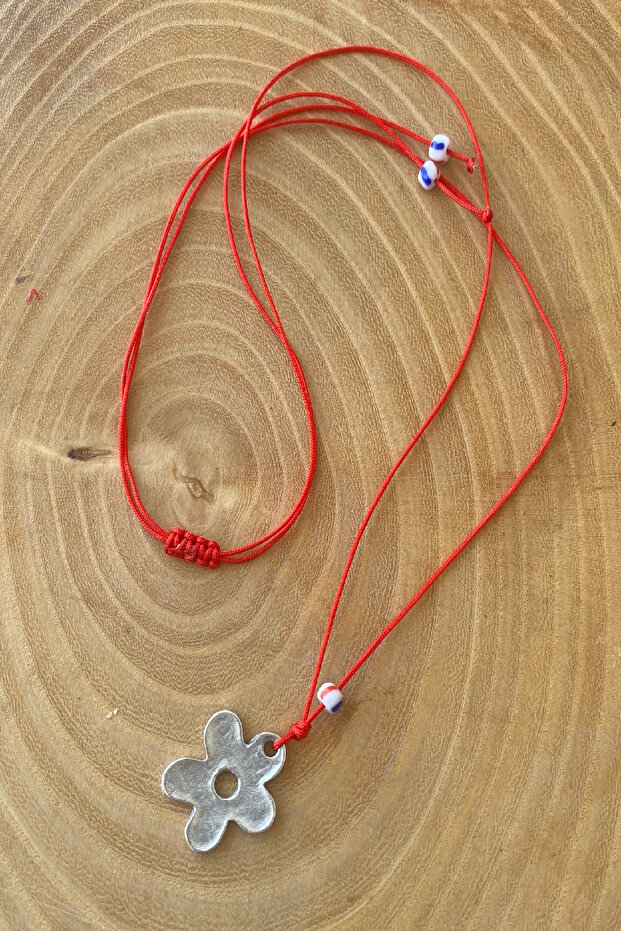 Adjustable Necklace with Red String and Silver Flower Object - 1