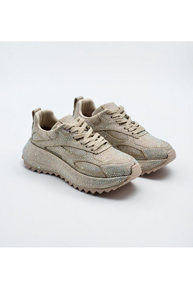 Woman's stone-studded sneaker