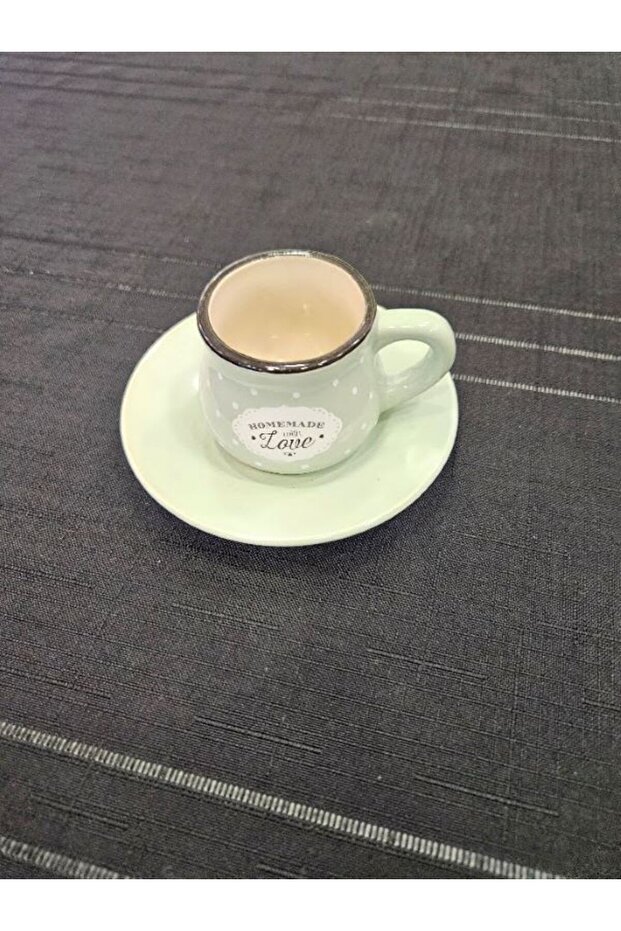 كوب قهوة أخضر منقط