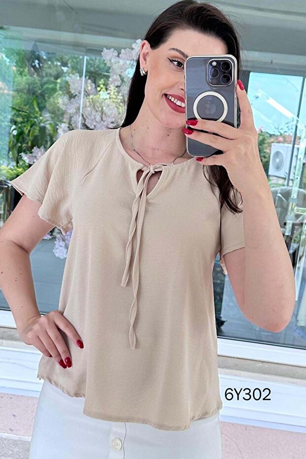 بلوزة إيروبين برباط على الرقبة 6y302