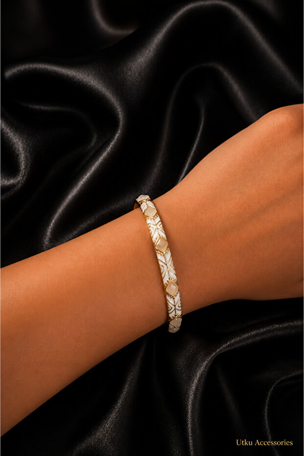 Cream Mineli Gold Cuffed Steel Bracelet