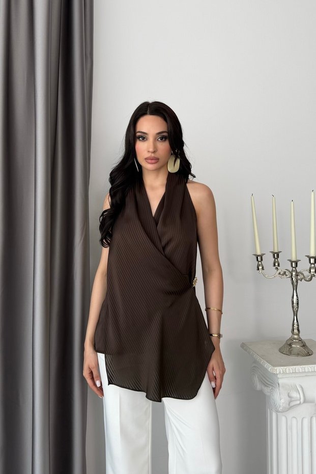 Brown double-breasted blouse with buckle detail and halter neck