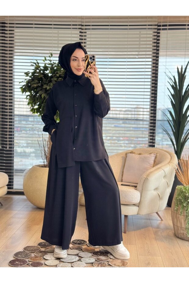 73067 بدلة سوداء مع قطعة جانبية يسارية وتفاصيل جيب