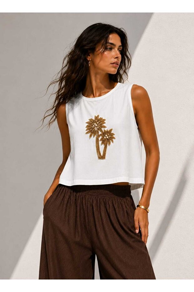 Stylish White Crop Top with Drop Stone Accessories
