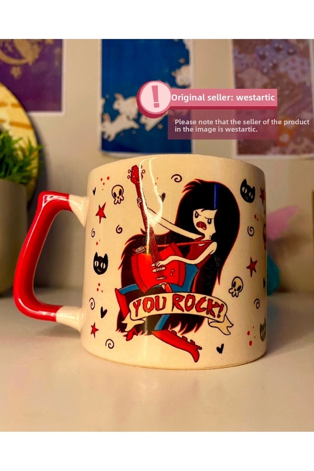 وقت المغامرة - كوب شاي وقهوة مطبوع عليه مارسيلين روك قوطي