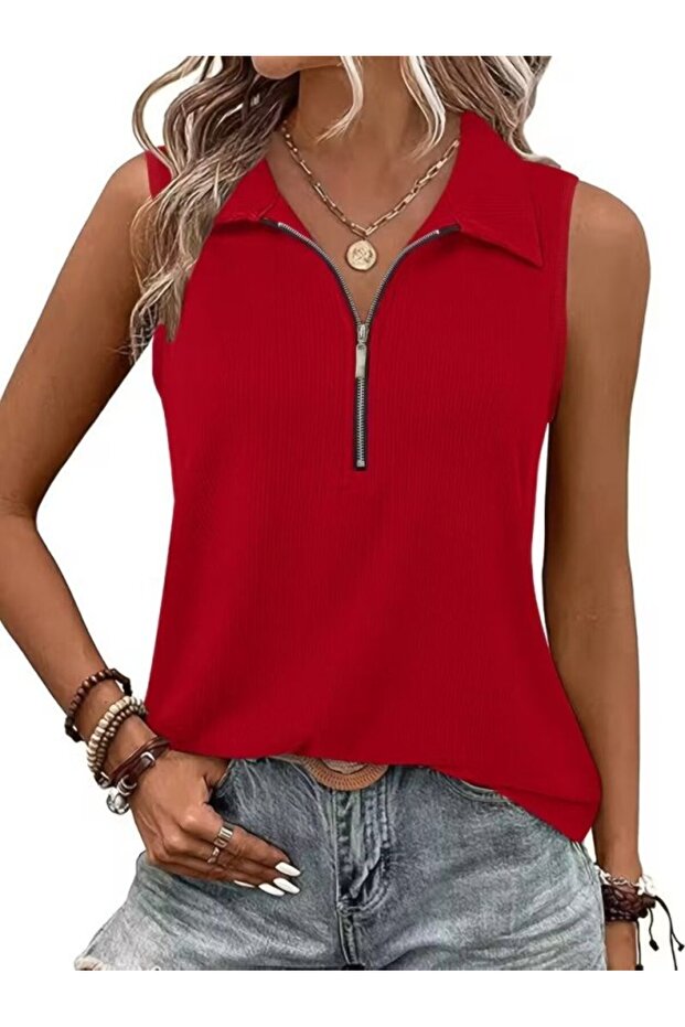 Women's collared, front-zip, ruffled blouse.