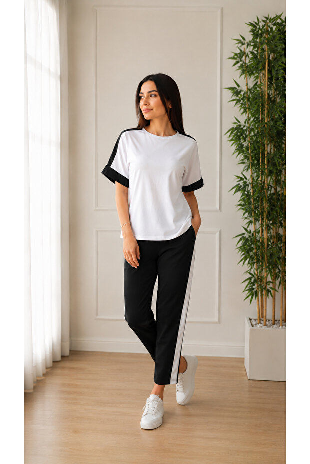 Casual Elegance Women's Stripe Detailed Crew Neck Modal Blouse and Pants Two-Piece Set