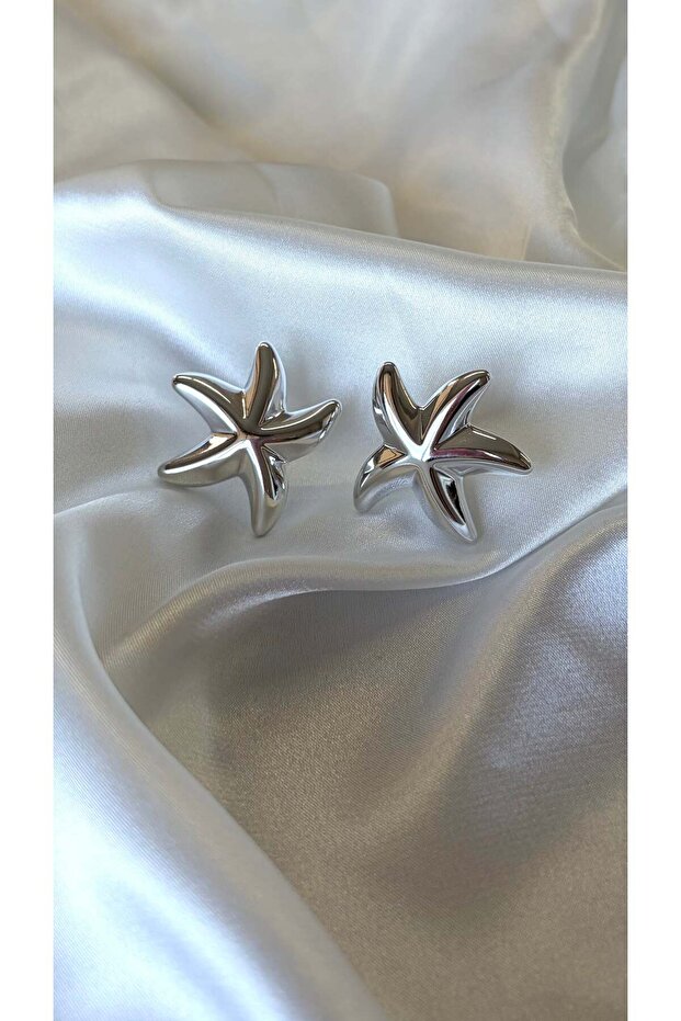 Women's silver color curved starfish earrings