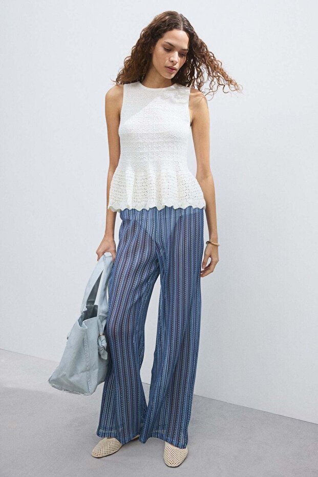 Wide hole-knit trousers