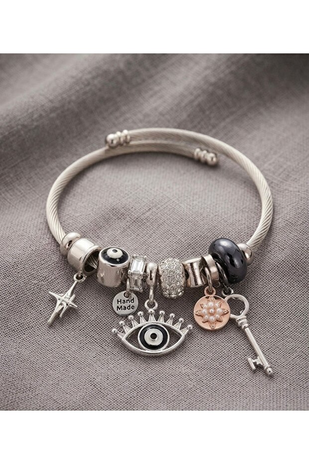 Steel Charm Bracelet with Eye-Puppet Design