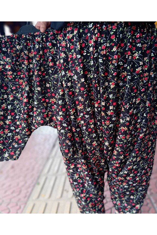 The price is for a single floral mother-daughter matching shalwar (trousers).