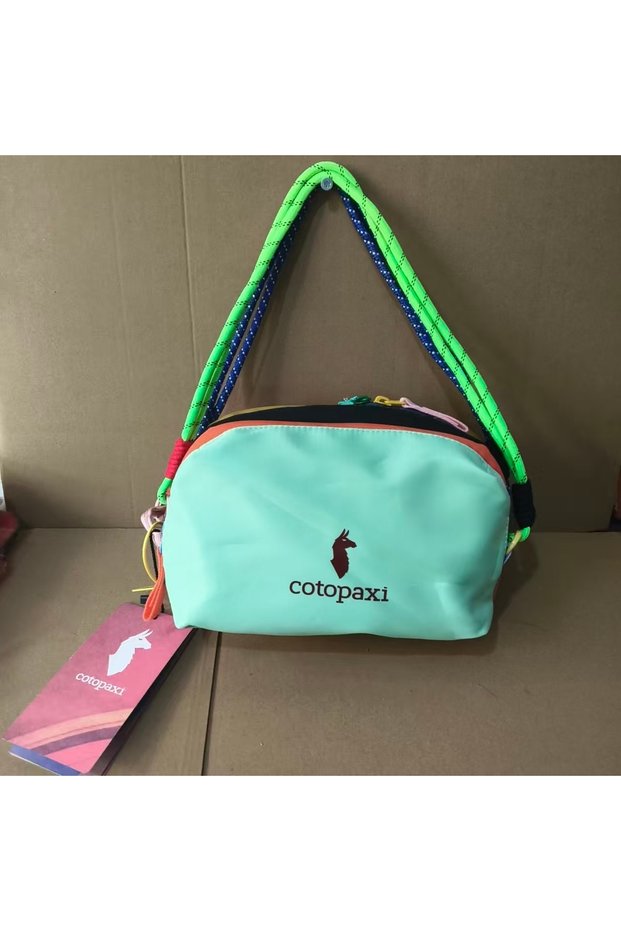 light green Alpaca Dopamine-Colored Wash & Storage Bag, Featuring Three Main Zipper Compartments for