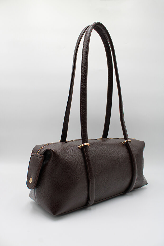 Women's Brown Long Handle Bag with Snap Detail and Internal Eyelet Lining for Hand, Arm, and Shoulder Use