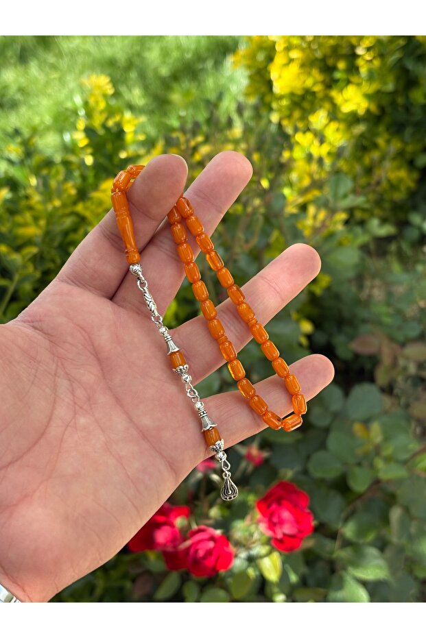 كبسولة من الخرز الزجاجي البرتقالي بطول الكاحل