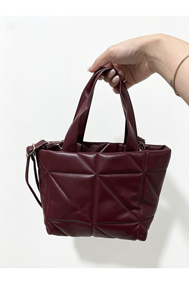 women hand and shoulder bag