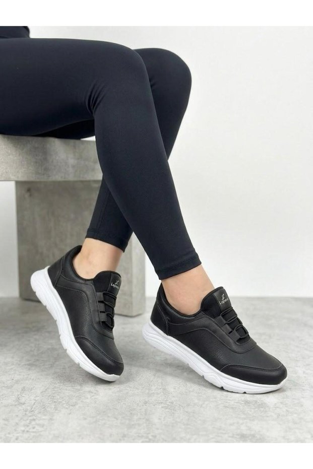 Women's black slip-on easy wear ultra lightweight orthopedic sole daily walking shoes