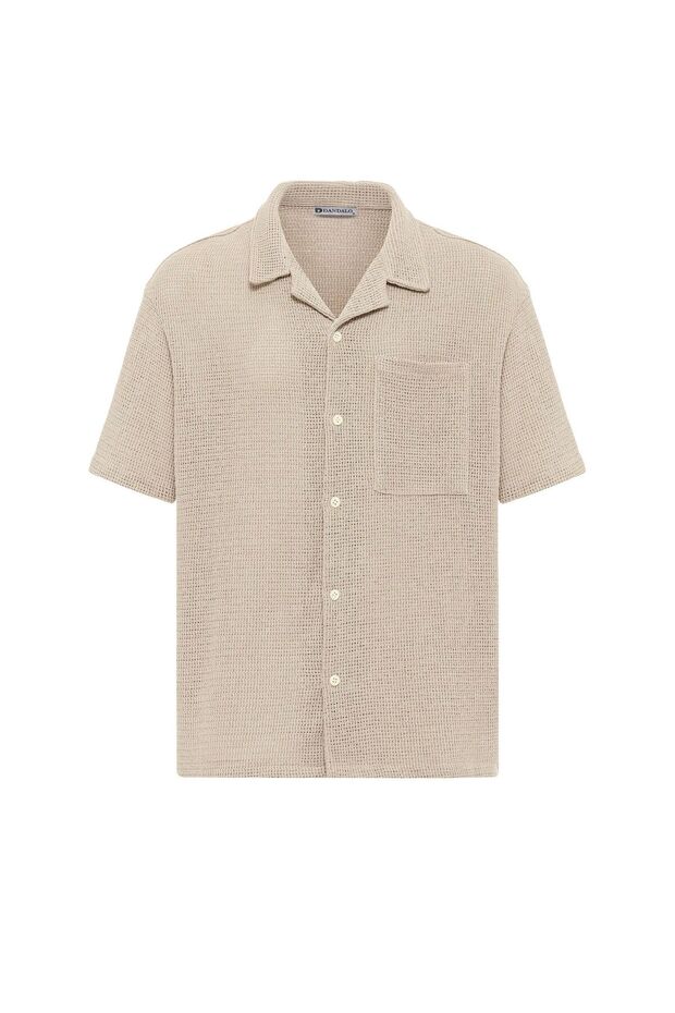 Oversize short sleeve knit shirt with pocket detail