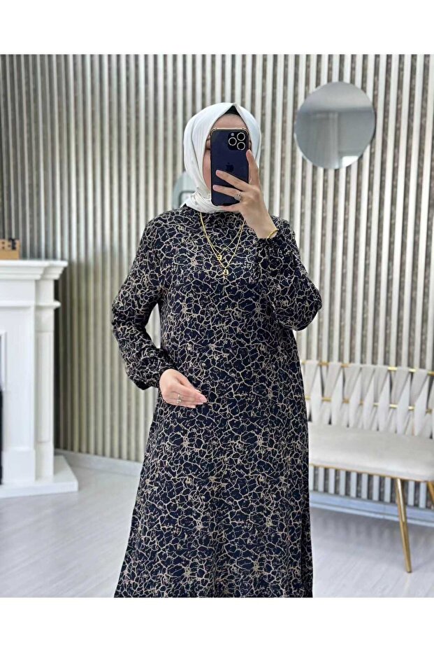 فستان من الفيسكون بتصميم متموج وتنورة منقوشة