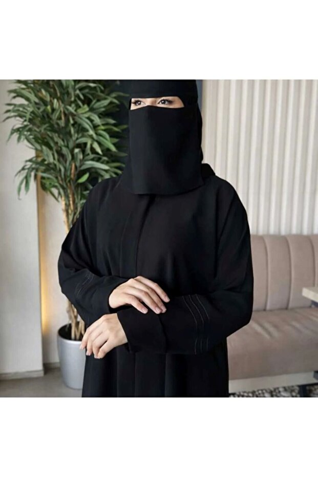 عباية هاجر -🖤 عباية سوداء أنيقة – تصميم عملي بلمسة عصرية 1