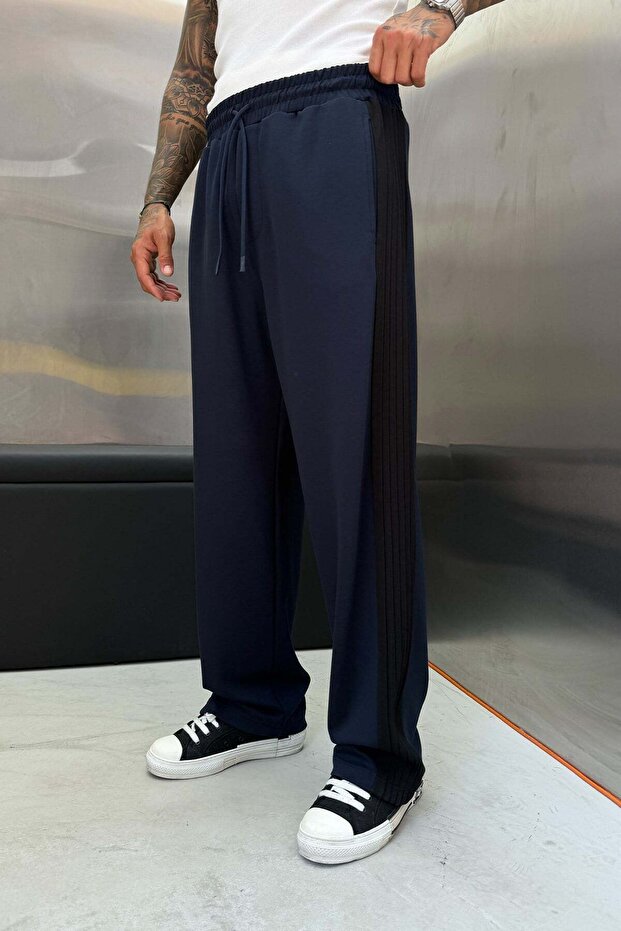 بنطلون رياضي رجالي OYSHO STRIPED SIX باللون الأزرق الداكن مقاس كبير