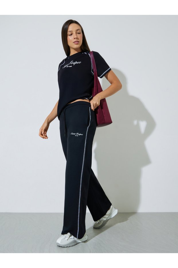 Black Wide Leg Joggers with Slogan and Cross Stitch Detail