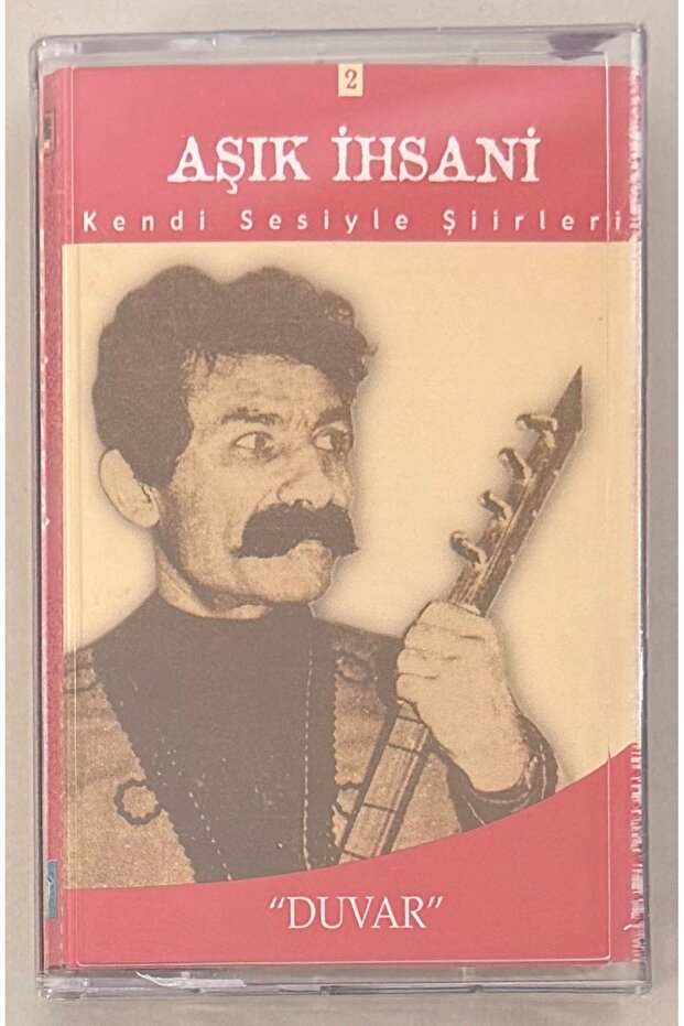 In Love, İhsani Reads His Own Poems on a Wall Tapestry (Zero with Gelatin)