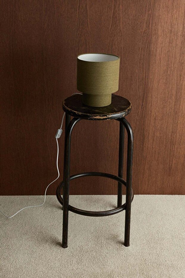 Small fabric-covered table lamp