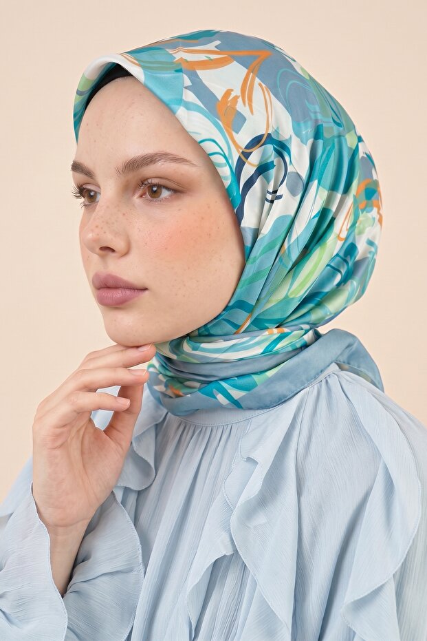 وشاح من القطن الناعم باللون الفيروزي بنمط الرسم المتموج
