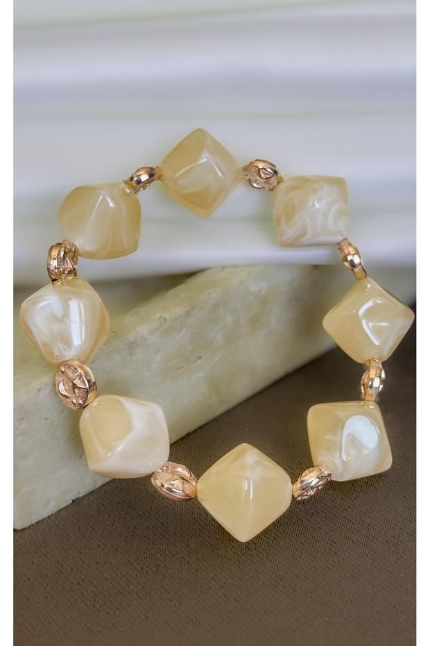 Pearlescent Beige Cube Beaded Acrylic Rubber Bracelet with Gold Detail