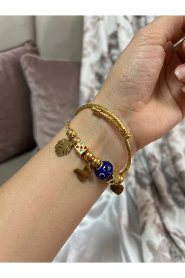 Women's Steel Charm Bracelet Gold Color Evil Eye Butterfly and Leaf Detailed Twist Cuff Bracelet
