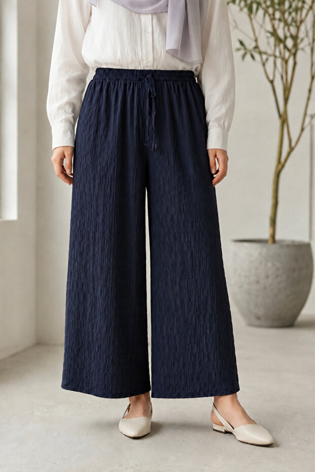 Smoked Elastic Waist Gofre Trousers