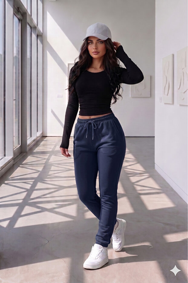 بنطال رياضي نسائي ذو أرجل مطاطية باللون الأزرق الداكن