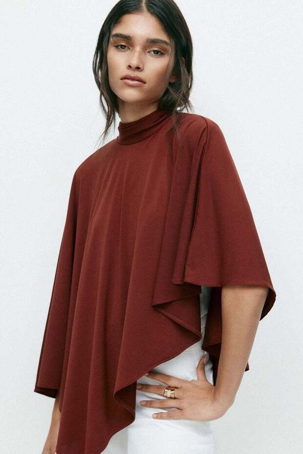 Asymmetric cape top