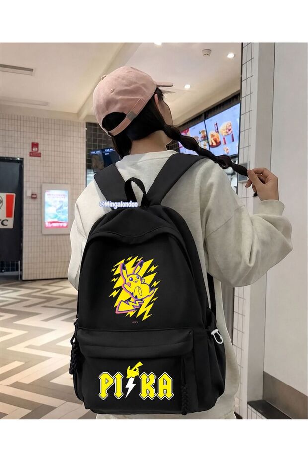 حقيبة مدرسية مطبوعة باللون الأسود من Pika MingaLondon