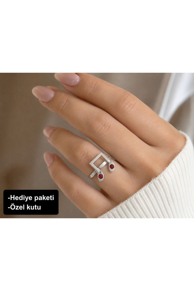 Red Detailed Metal Ring with Musical Notes – a Stylish Accessory for Music Lovers