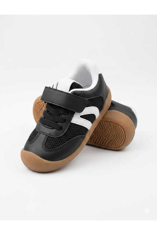 حذاء رياضي للأطفال من الجنسين من UNISEX FIRST STEP - أسود