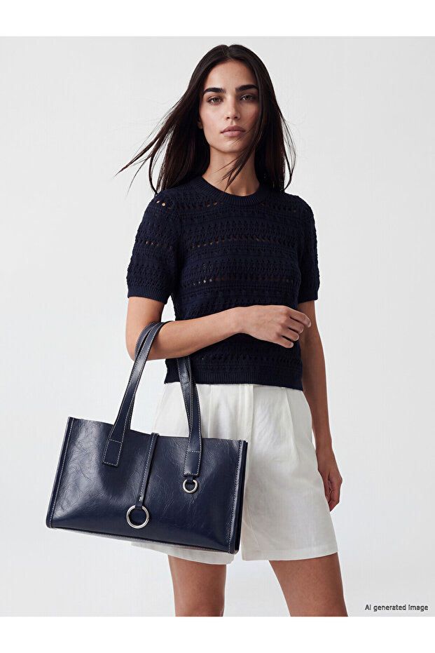 Nevavm Leather Look Women's Shoulder Bag with a Difference