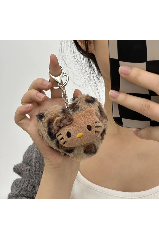 A New Cute Autumn and Winter Leopard Print Plush Cat Doll Bag Schoolbag Keychain Doll Pendant Decor.