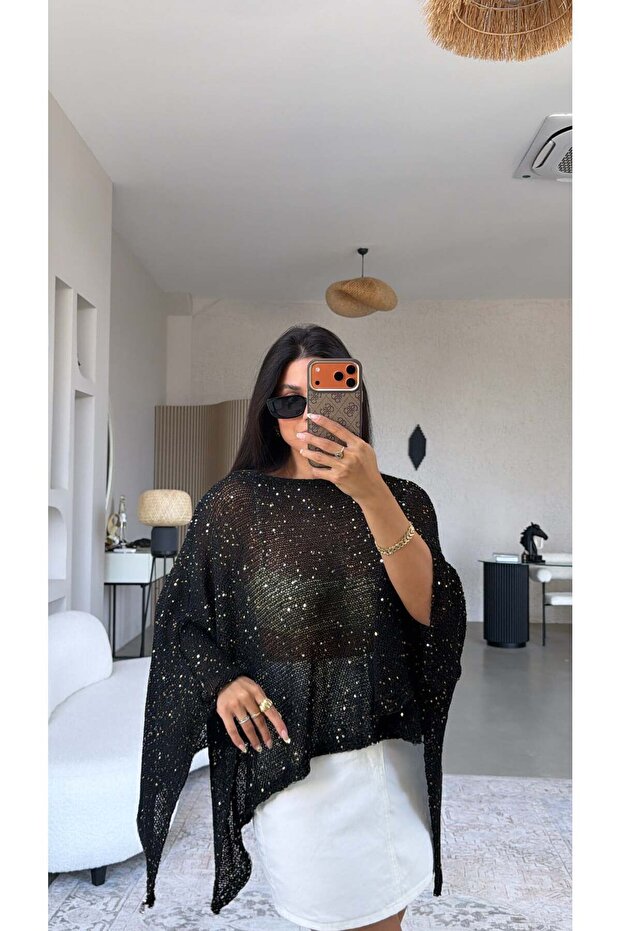 عباءة سوداء مزينة بالترتر من قماش الميرسيريزد
