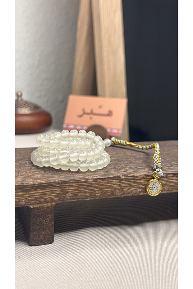نواعم مضيئة بـ ساعة كلاسيكية وشكة ( ذهبية )
