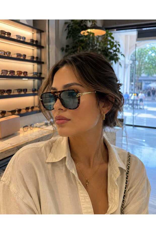 نظارات شمسية من الزجاج الأخضر