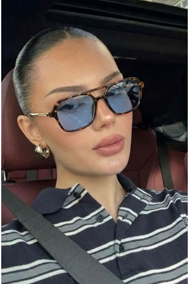 نظارات كلاسيكية مستطيلة بإطار سميك