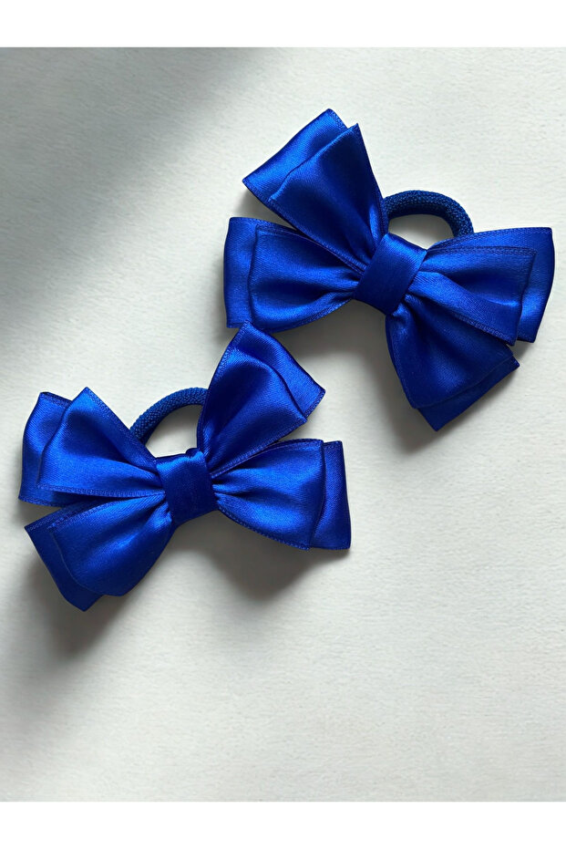 مجموعة من قطعتين من مشابك الفيونكة والشريط